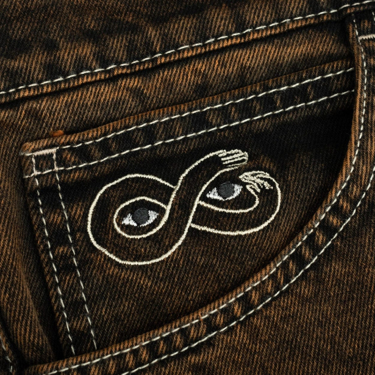 Magenta Skateboards OG Denim Jeans in bronze color, showing fit and texture of stylish casual denim pants.