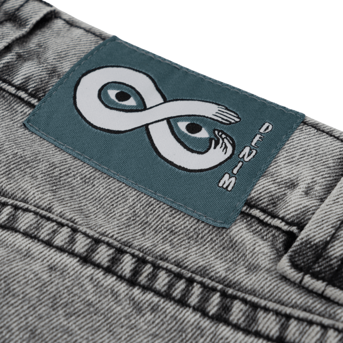 Magenta Skateboards OG Denim Stitch Jeans in acid wash, showing classic denim style with visible stitching and relaxed fit.