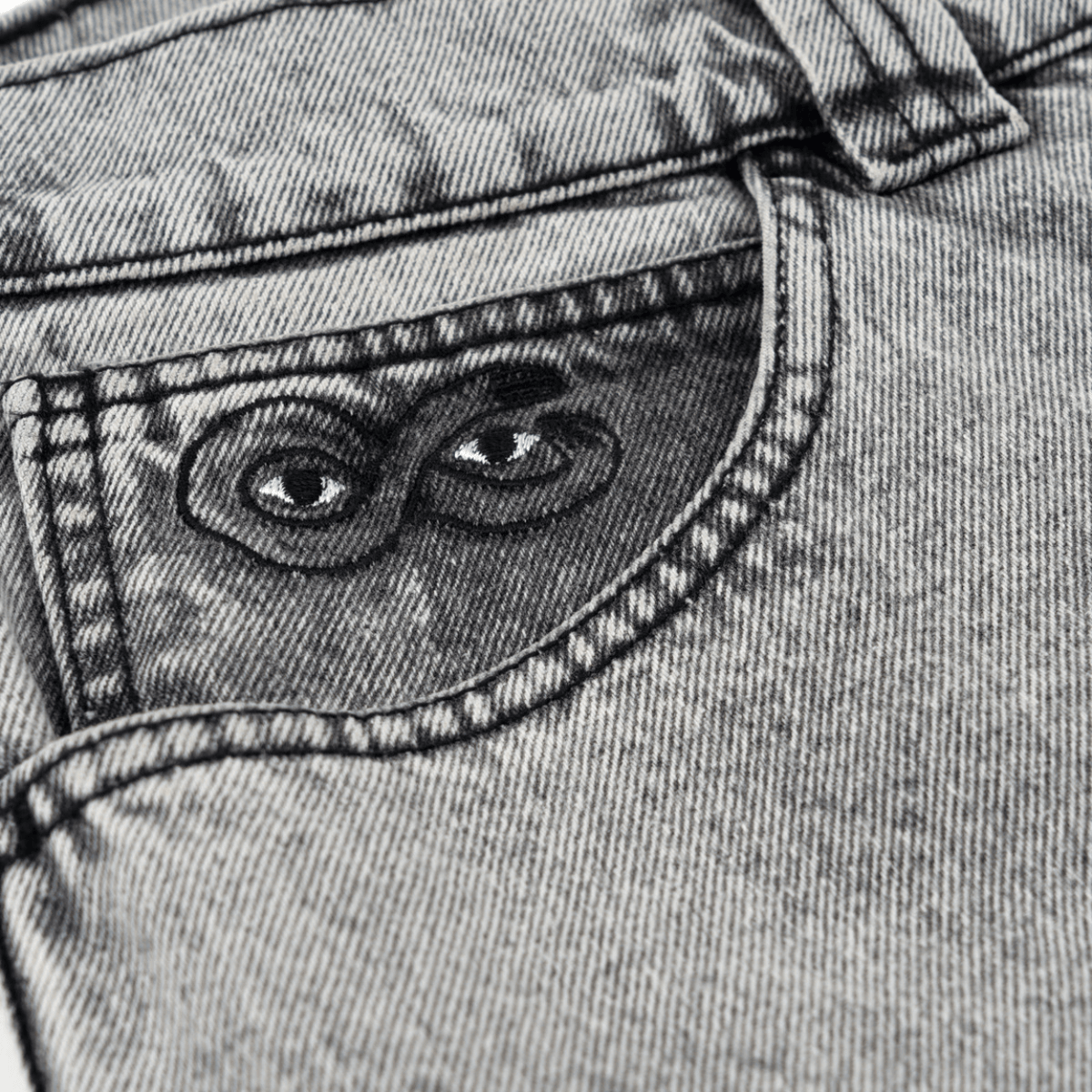 Magenta Skateboards OG Denim Stitch Jeans in acid wash with visible stitching, casual fit, and classic denim style.