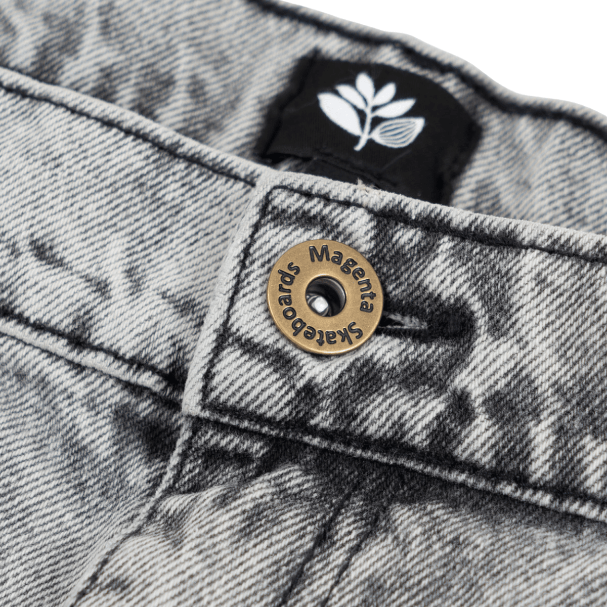 Magenta Skateboards OG Denim Long Shorts in acid wash, featuring a relaxed fit and classic denim design for skateboarding and casual wear.