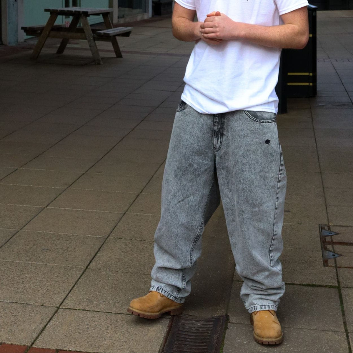 Magenta Skateboards OG Denim Stitch Acid jeans showing blue denim fabric with magenta stitching and a slim fit design.