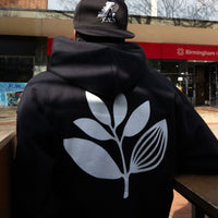 Magenta Skateboards Plant hoodie in black, featuring a colorful plant graphic on the front, casual fit and soft fabric for skateboarding.