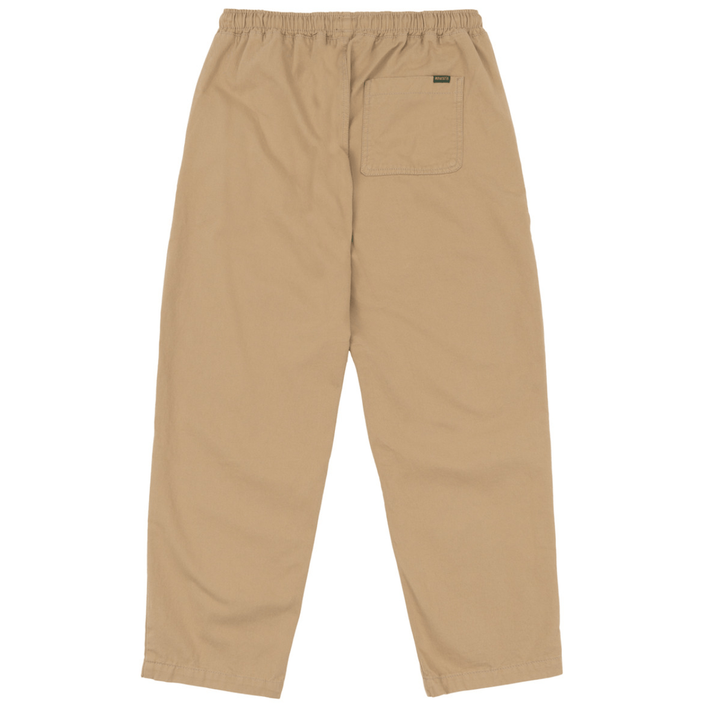 Magenta Skateboards Slack Pants in beige, casual trousers with a relaxed fit and stylish design, made by Magenta Skateboards.