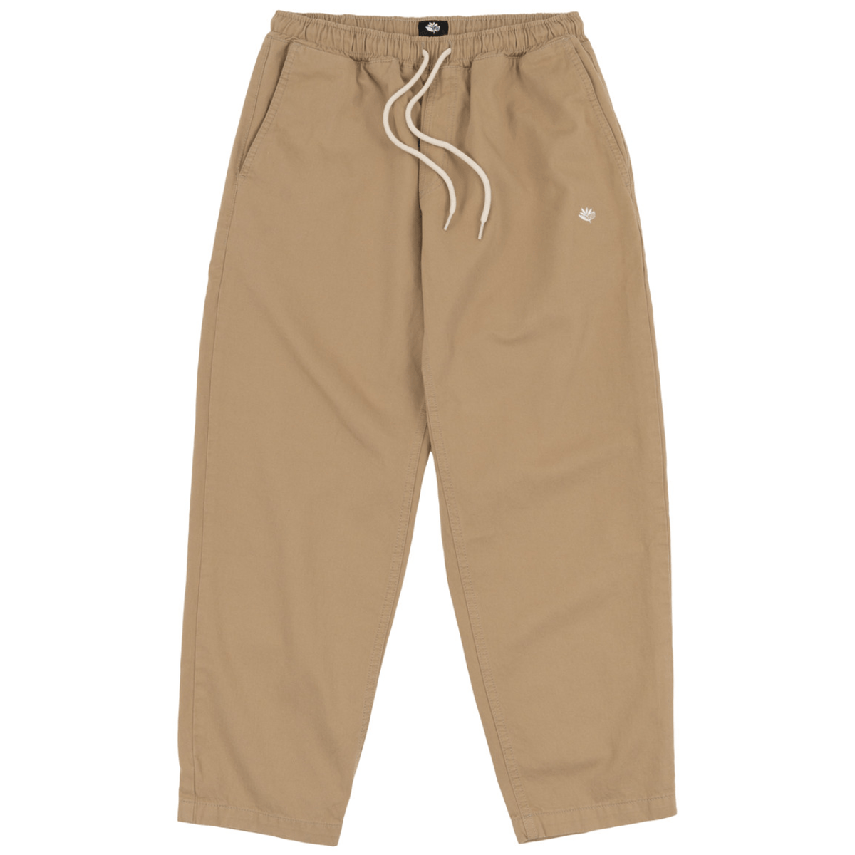 Beige Magenta Skateboards Slack Pants, casual trousers with a relaxed fit and brand logo, displayed on a plain background.