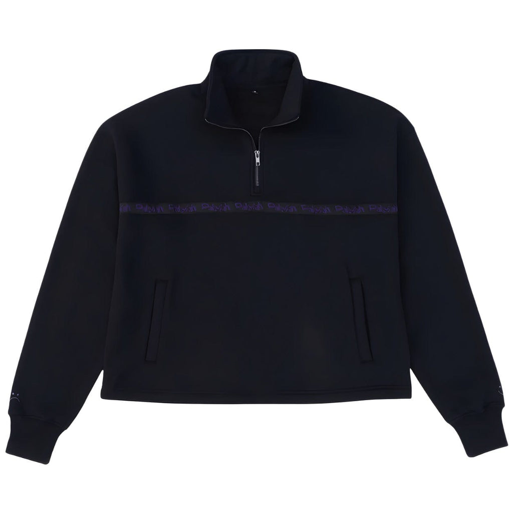 Black Palmah NZ Surf quarter zip fleece, cozy and stylish, shown on a person wearing the fleece outdoors.