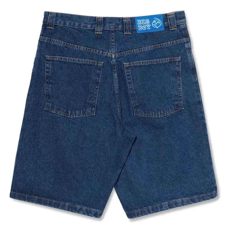 Dark blue Polar Skate Co Big Boy Shorts displayed on a model, showcasing casual, relaxed-fit skate shorts for everyday wear.