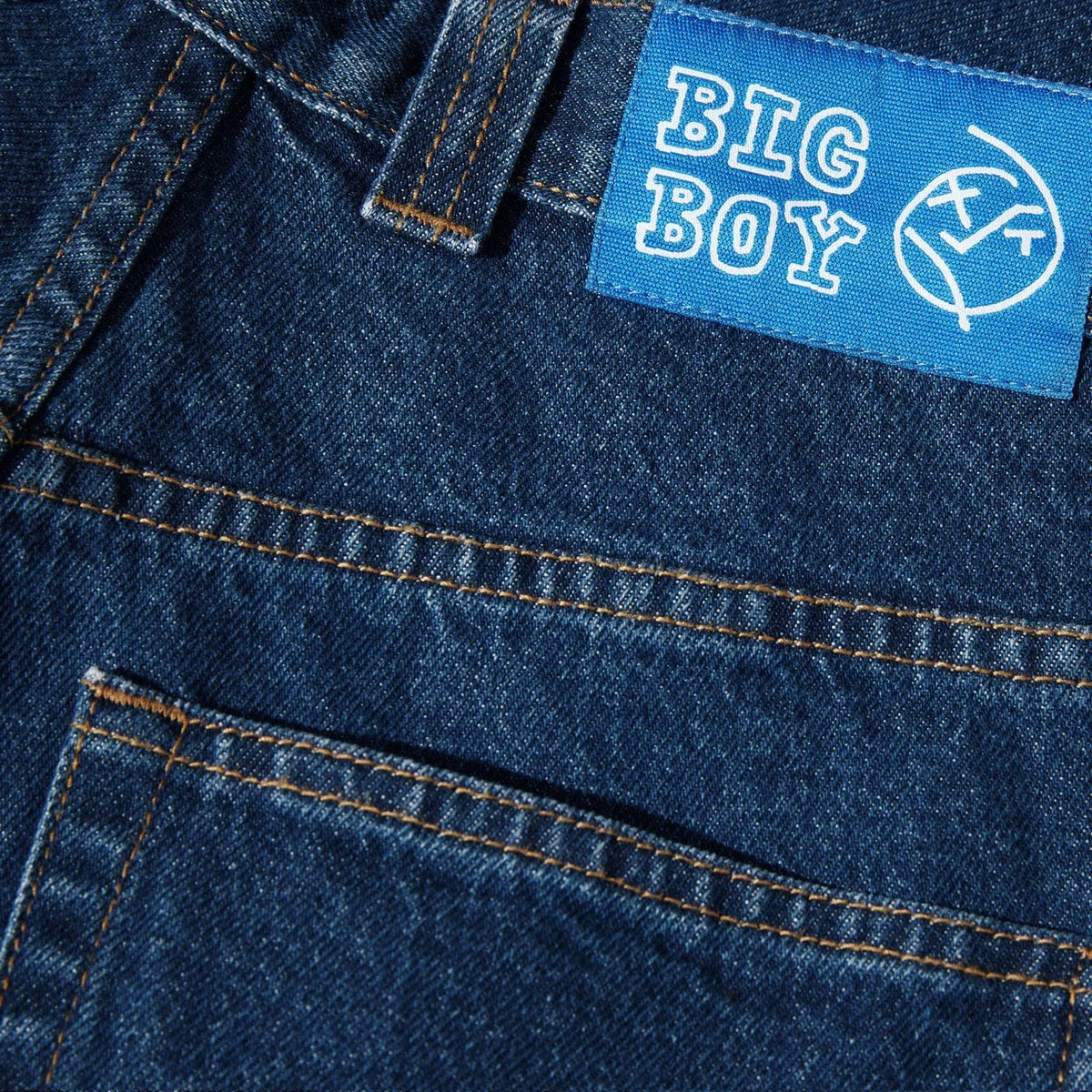 Dark blue Polar Skate Co Big Boy Shorts laid flat, showing the casual denim-style design and relaxed fit of these skate shorts.