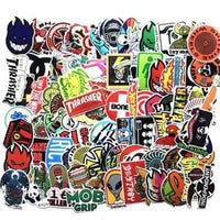 Colorful skateboard stickers featuring The Vines skateboarding brand logos and designs, perfect for customizing skateboards.