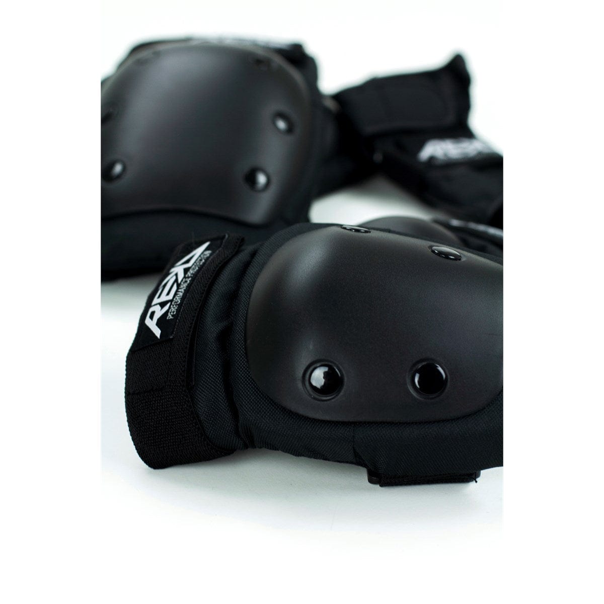 Rekd Heavy Duty 3-Piece Triple Pad Set by Triple 8 in black, including knee, elbow, and wrist pads for protection.