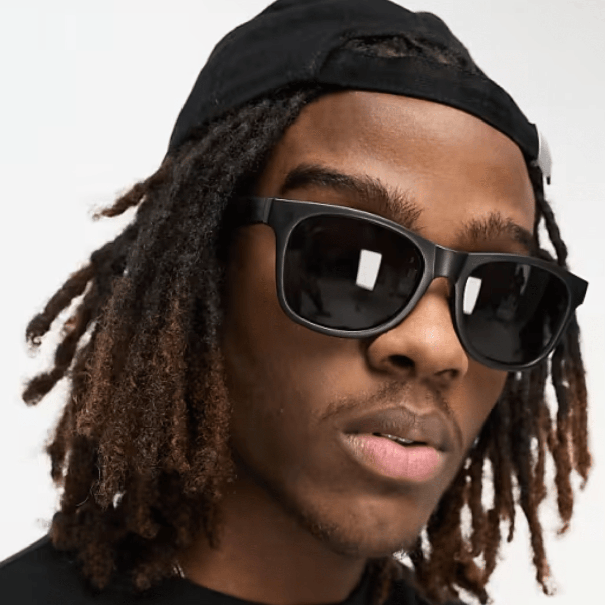 Black Vans Spicoli 4 Shades sunglasses with classic rectangular frames and dark lenses, showcasing stylish eyewear design.