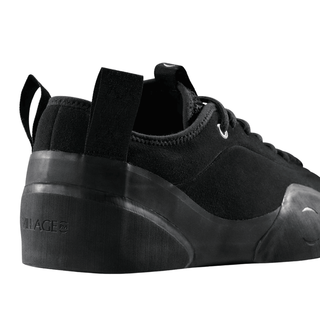 Village PM 1:00 PM suede skate shoes in black, showing the stylish low-top shoes with textured suede material and skateboarding design.