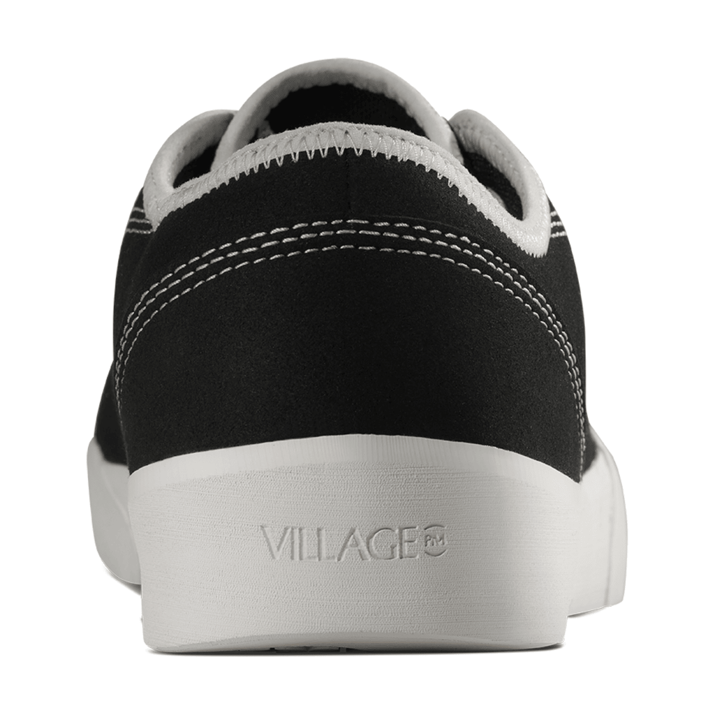 Village PM 1:30 PM skate shoes in black and white canvas with classic design and skateboarding style.