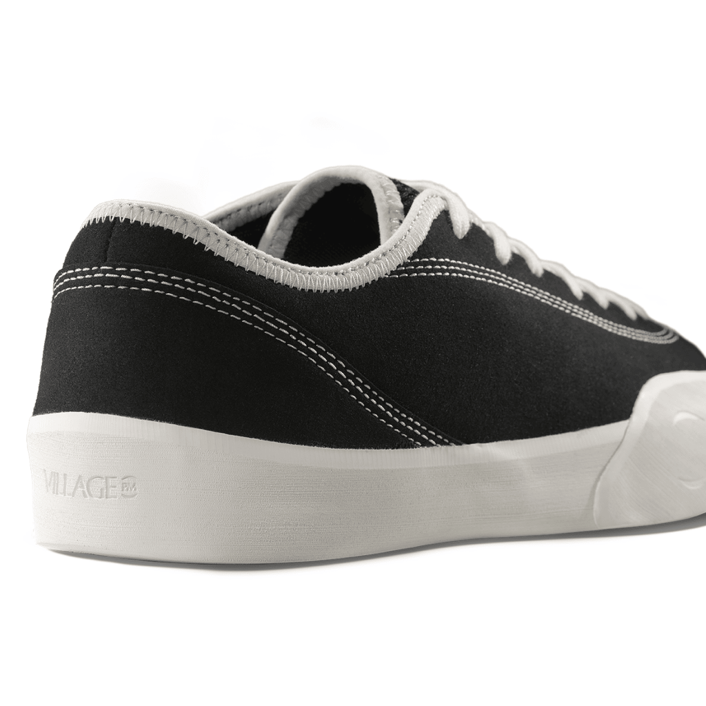 Village PM 1:30 PM skate shoes in black and white canvas with classic design, suitable for skating and casual wear.