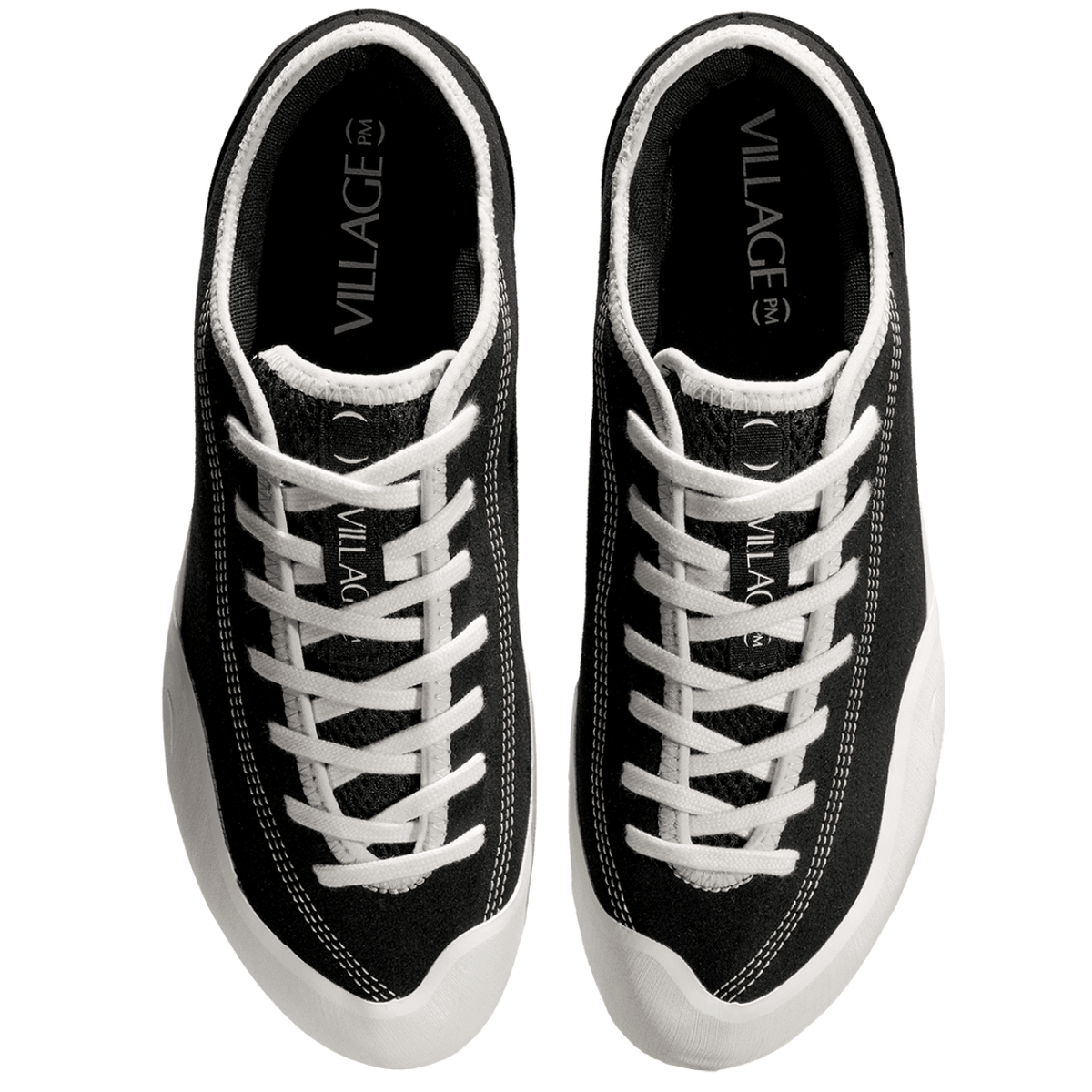 Village PM 1:30 PM skate shoes in black and white, canvas design, casual footwear for skateboarding and everyday wear.