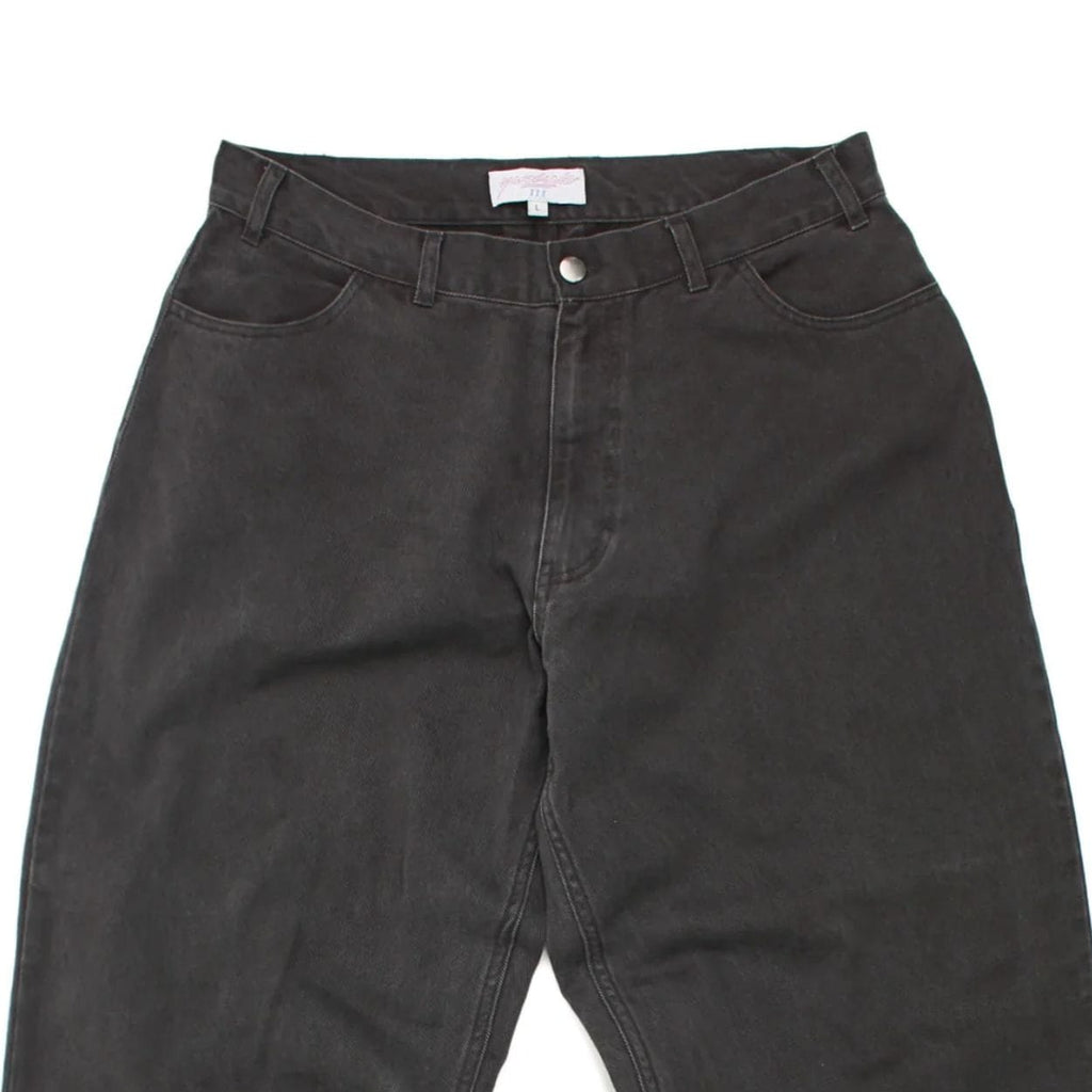 Black Yardsale Phantasy Slacks jeans with a slim fit, featuring classic five-pocket design and modern style.