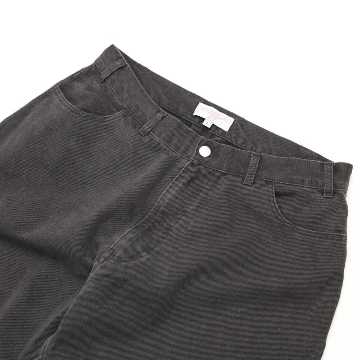 Black Yardsale Phantasy Slacks jeans showing a slim fit design with front pockets and stylish stitching.